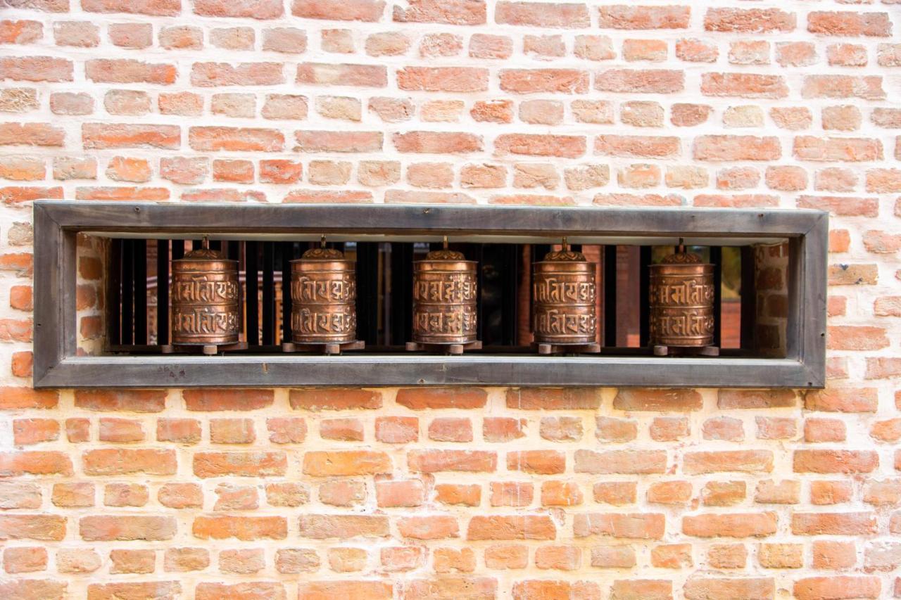 Basera Boutique Hotel Katmandu Dış mekan fotoğraf Prayer wheels at the temple