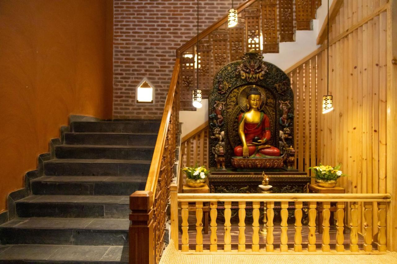 Basera Boutique Hotel Katmandu Dış mekan fotoğraf The Buddha statue at the entrance of the hotel